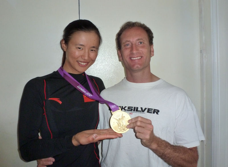 London 2012 Laser Radial gold medalist Lijia Xu with coach Jon Emmett photo copyright Jon Emmett Sailing taken at Weymouth & Portland Sailing Academy and featuring the ILCA 6 class