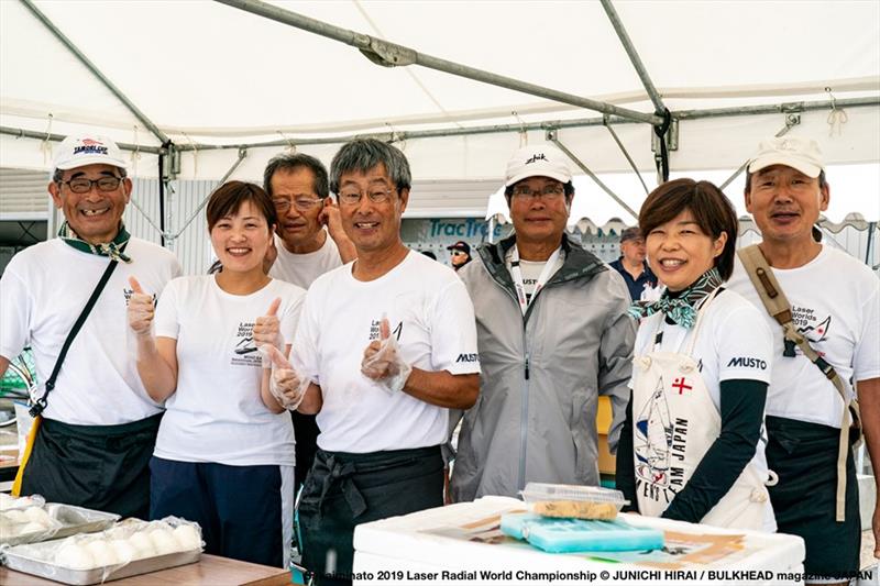 A happy volunteer crew at the Laser Cafe on day 3 of the ILCA Laser Radial World Championships in Japan photo copyright Junichi Hirai / Bulkhead Magazine Japan taken at  and featuring the ILCA 6 class