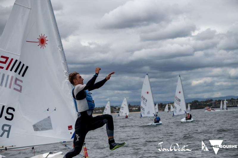 Men’s World Champion, Daniil Krutskikh jumps into Port Phillip Bay - Laser Radial World Championship 2020 photo copyright Jon West Photography taken at  and featuring the ILCA 6 class