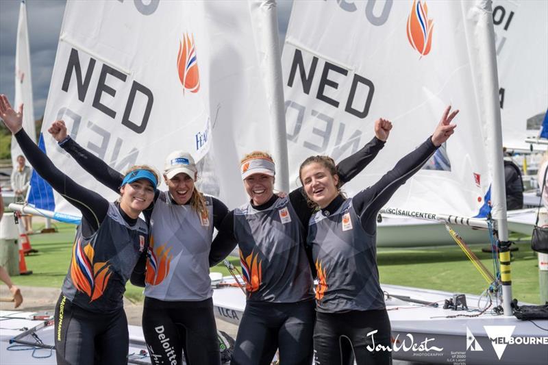 The Dutch team celebrates the World Championship win by Marit Bouwmeester (second from left) photo copyright Jon West Photography taken at  and featuring the ILCA 6 class