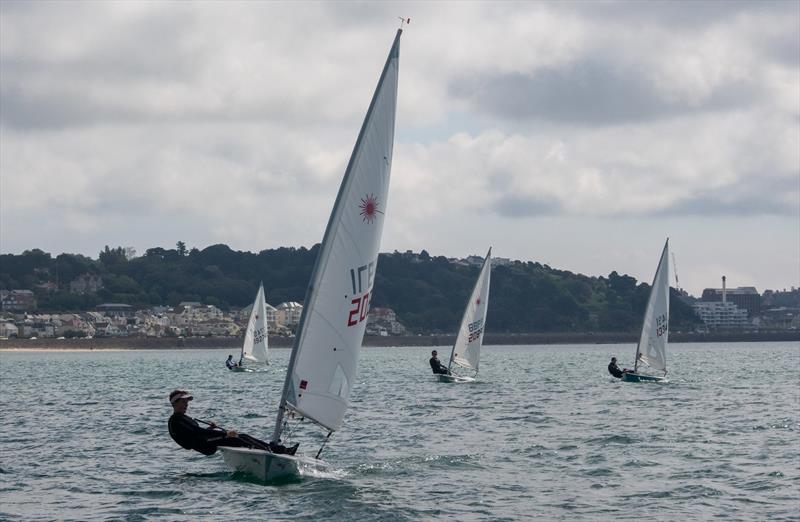 Testarossa in the lead during the Royal Channel Islands Yacht Club Spring Regatta 2022 photo copyright Simon Ropert taken at Royal Channel Islands Yacht Club and featuring the ILCA 6 class