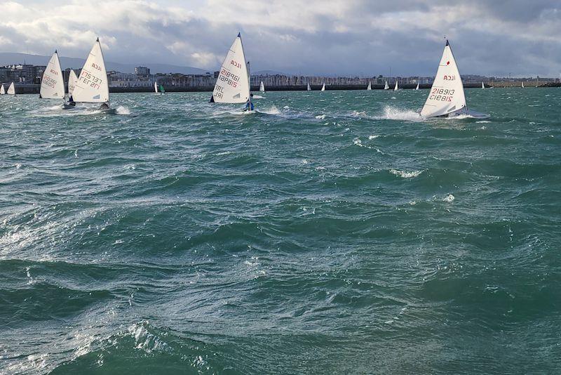 High speed off-wind action from the ILCA 6s - Viking Marine DMYC Frostbite Series 2 day 5 photo copyright Ian Cutliffe taken at Dun Laoghaire Motor Yacht Club and featuring the ILCA 6 class