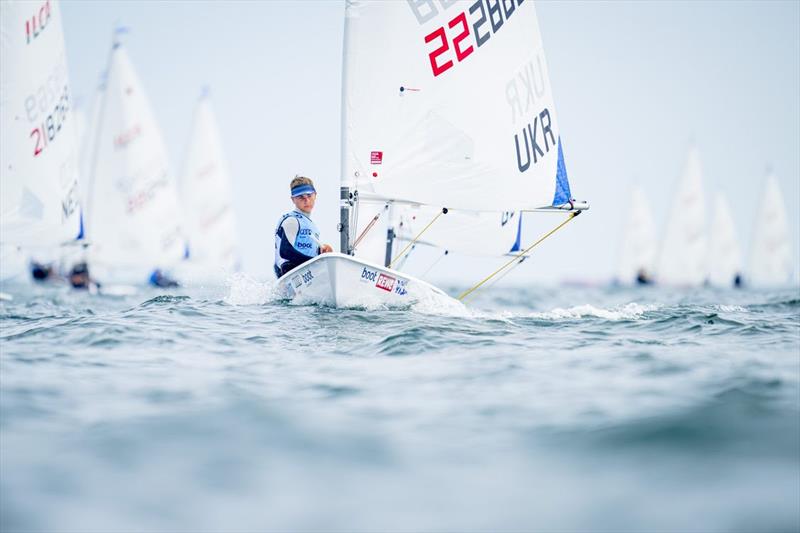 Ukraine's Dimak Karabadzhak on the ILCA 6 race course at Kiel Week photo copyright Kiel Week / Sascha Klahn taken at Kieler Yacht Club and featuring the ILCA 6 class