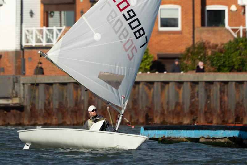 James Hutton-Penman sails by the town quay - first races of the RCYC Snow Globe - photo © Petru Balau Sports Photography / sports.hub47.com