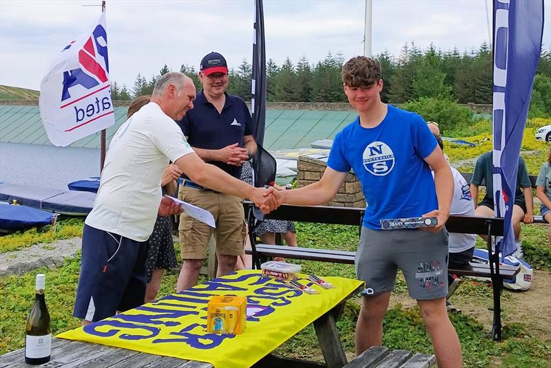 Winners collecting prizes - North ILCA UK circuit event at Pennine SC photo copyright Helen Dengate taken at Pennine Sailing Club and featuring the ILCA 6 class