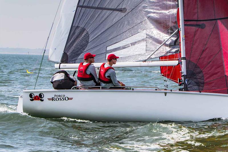 Skipper Elliott Noye has his head down checking to leeward on Porco Rosso on day 2 of the SB20 Worlds at Cowes  photo copyright Jennifer Burgis taken at Royal Yacht Squadron and featuring the SB20 class