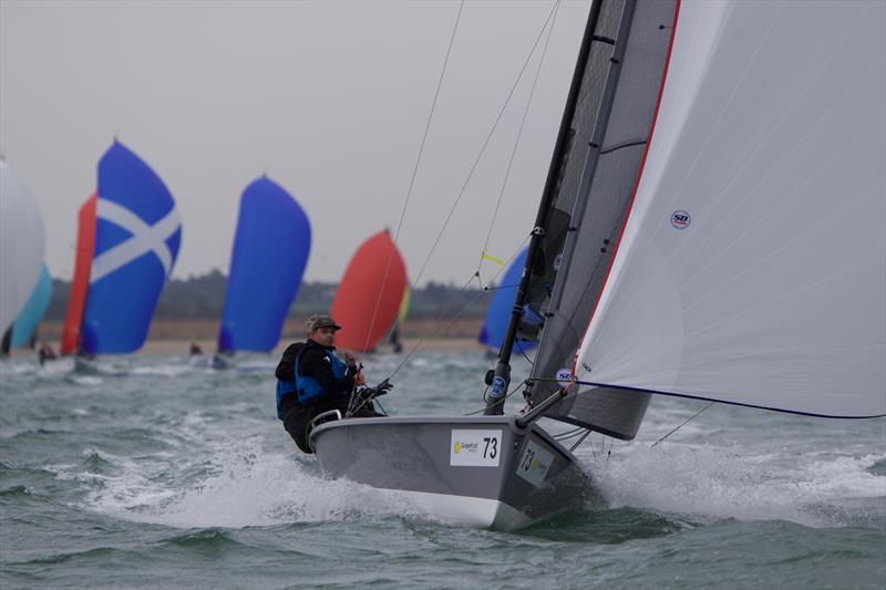 Overall leader Export Roo powers downwind on day 3 of the SB20 Worlds at Cowes photo copyright Jennifer Burgis taken at Royal Yacht Squadron and featuring the SB20 class