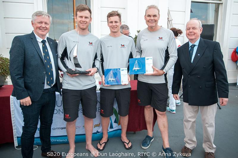 Porco Rosso team with trophies, left to right, Elliott Noye, Paul McCartney, Edward Snowball - 2018 SB20 European Championship photo copyright Anna Zykova taken at Royal Irish Yacht Club and featuring the SB20 class