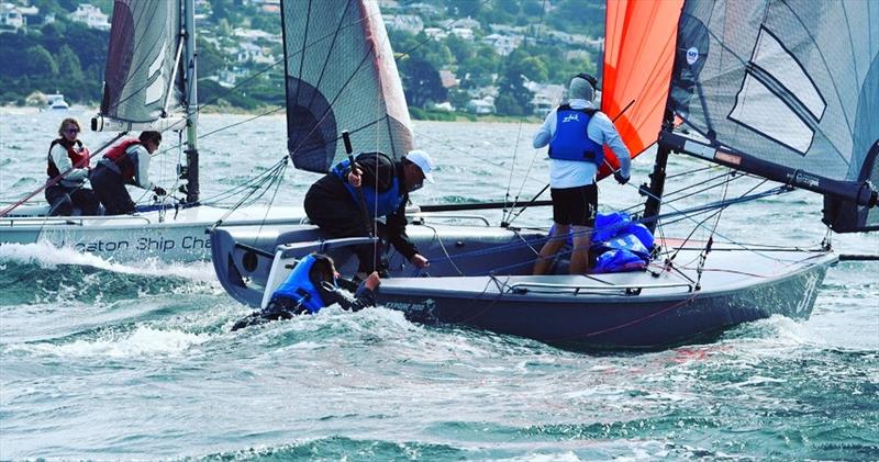 Sam Tiedemann hangs onto the transom of the SB20 Export Roo after falling overboar - Crown Series Bellerive Regatta - photo © Steve Catchpool