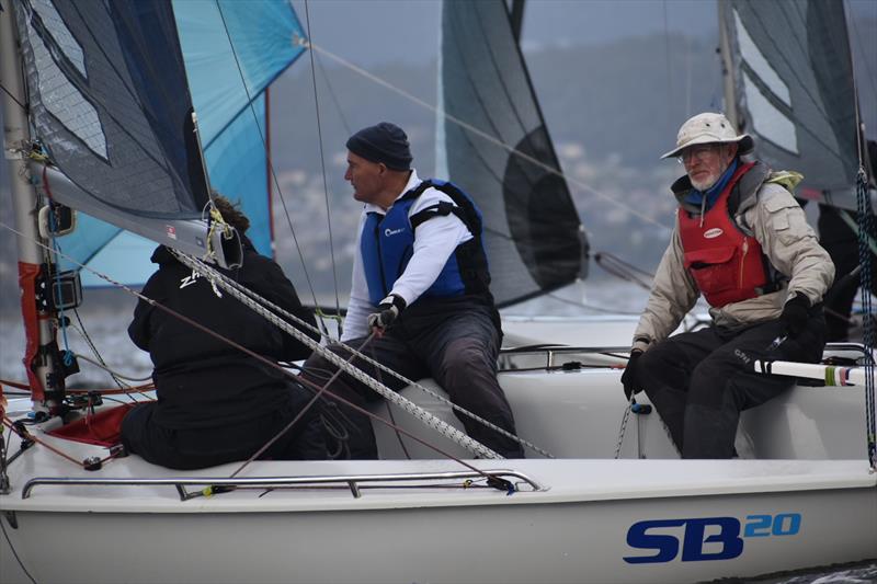 Max Gluskie, Murray Jones and David Graney, skipper of Wedgewood photo copyright Jane Austin taken at Royal Yacht Club of Tasmania and featuring the SB20 class