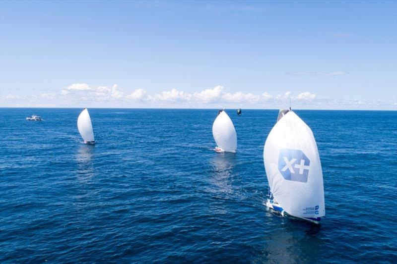 The Figaros after the passage of the lighthouse of Bishop during the 2nd stage of the  50th La Solitaie URGO Le Figaro photo copyright Alexis Courcoux taken at  and featuring the Figaro class