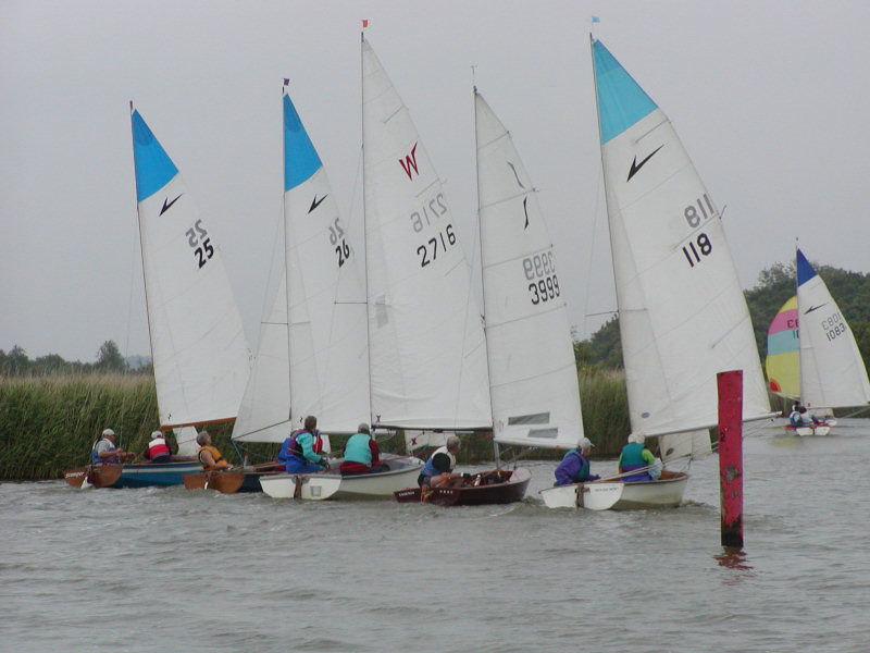 Leaders sandwich a Wayfarer & Solo at Hickling Broad photo copyright James Savage taken at Hickling Broad Sailing Club and featuring the Leader class
