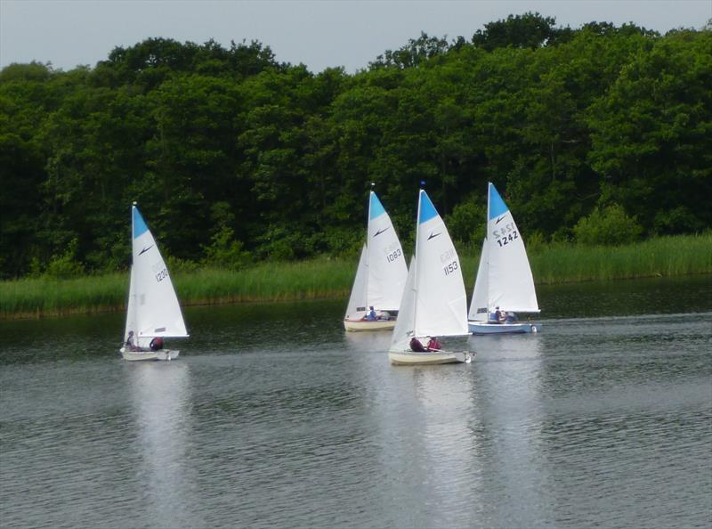 Racing during the Leader open at Rollesbury Broad photo copyright Leader class taken at Rollesby Broad Sailing Club and featuring the Leader class