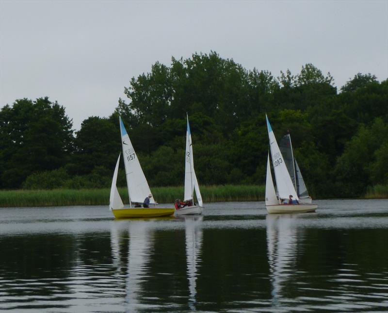 Close mark rounding during the Leader open at Rollesbury Broad photo copyright Leader class taken at Rollesby Broad Sailing Club and featuring the Leader class