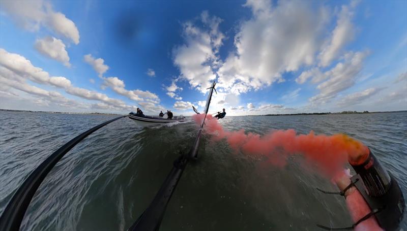 Using smoke to asses the flow structures around the sail and boat - photo © Lennon Sails