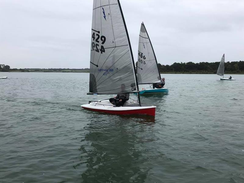 Robbie Claridge vs. Paul White during the Lightning 40th Anniversary Nationals at Northampton photo copyright NSC taken at Northampton Sailing Club and featuring the Lightning 368 class