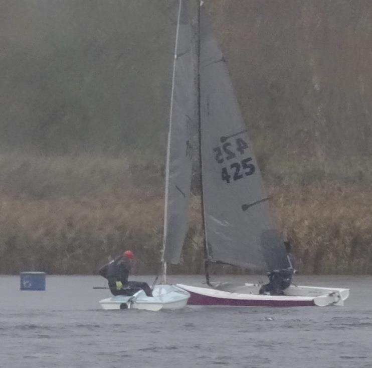 Winner Penny Harris crosses Jeremy Cooper during the Allen Brothers Lightning 368 Inlands at West Oxfordshire SC photo copyright Robbie Claridge taken at West Oxfordshire Sailing Club and featuring the Lightning 368 class