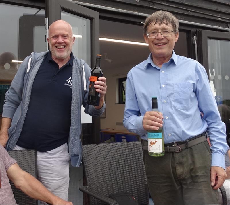 Stephen Hodgson and Ian Ransom get a prize for travelling the furthest during the Noble Marine Lightning 368 Open at Haversham photo copyright Chris Hughes taken at Haversham Sailing Club and featuring the Lightning 368 class