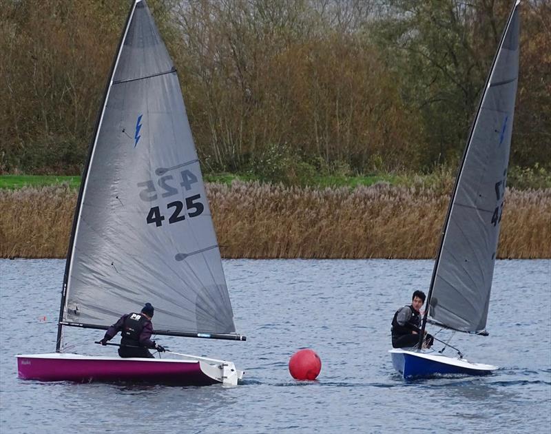 Penny Yarwood leads Robbie Claridge in a battle for the lead during the Noble Marine Lightning 368 Open at West Oxfordshire SC photo copyright John Claridge taken at West Oxfordshire Sailing Club and featuring the Lightning 368 class