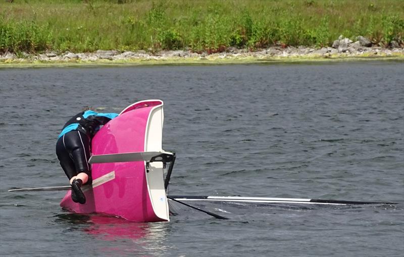 A fate suffered by many befalls Caroline Hollier during the Lightning 368 Northern Championship at Shotwick Lake photo copyright Richard Stratton taken at Shotwick Lake Sailing and featuring the Lightning 368 class
