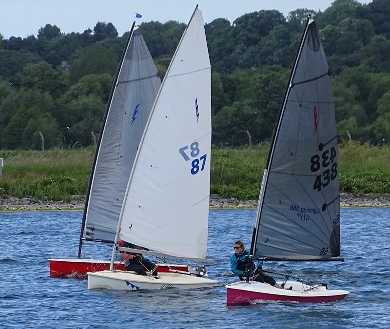 Caroline Hollier battling with Ceri James during the Lightning 368 Northern Championship at Shotwick Lake photo copyright Richard Stratton taken at Shotwick Lake Sailing and featuring the Lightning 368 class