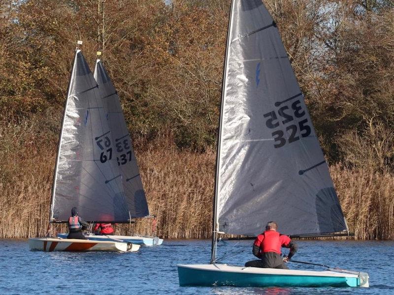 Paul Beven keeps a close eye on Marion Turberfield and Ben Twist - Lightning 368 Rum & Mince Pie open meeting at West Oxfordshire photo copyright Stewart Eaton taken at West Oxfordshire Sailing Club and featuring the Lightning 368 class