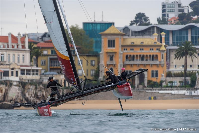 M32 off the beach outside the Marina Cascais photo copyright Ricardo Pinto taken at  and featuring the M32 class