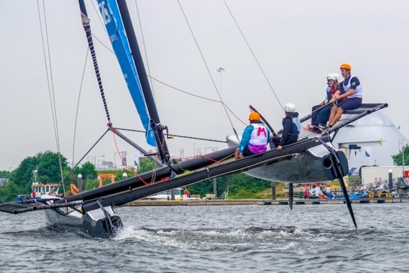 M32 sailing with the Volvo Ocean Race teams at the event photo copyright Caron Saul taken at RYA Cymru-Wales and featuring the M32 class