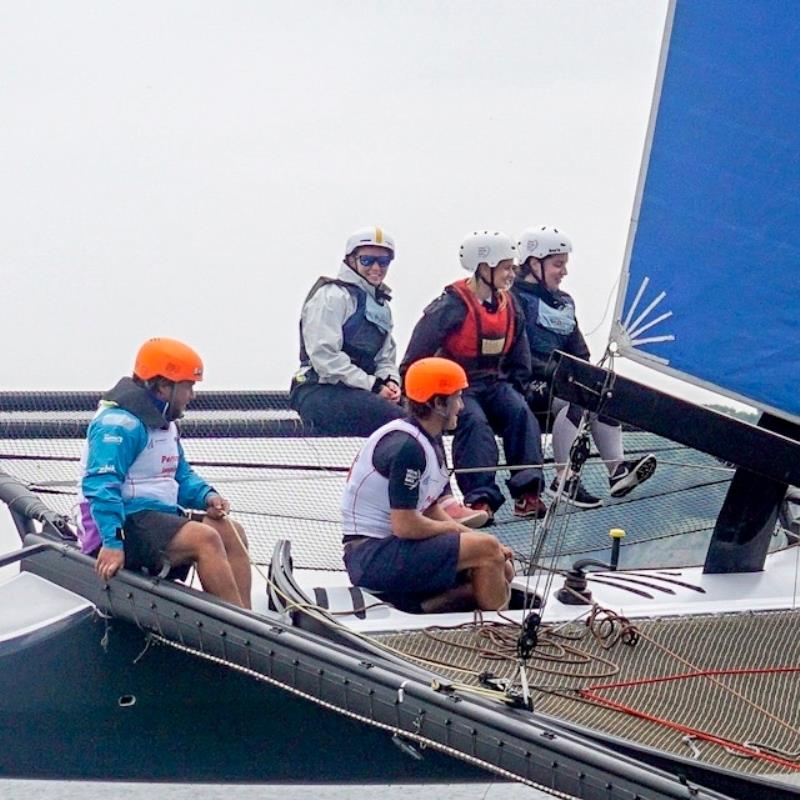 M32 sailing with the Volvo Ocean Race teams at the event photo copyright Caron Saul taken at RYA Cymru-Wales and featuring the M32 class