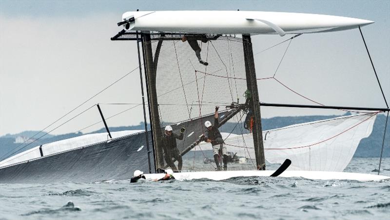 Richard Göransson's Inga from Sweden capsized in a gust during the final race, but was righted and back racing in two minutes. - M32 European Series Marstrand 2019 - photo © Drew Malcolm / M32 World