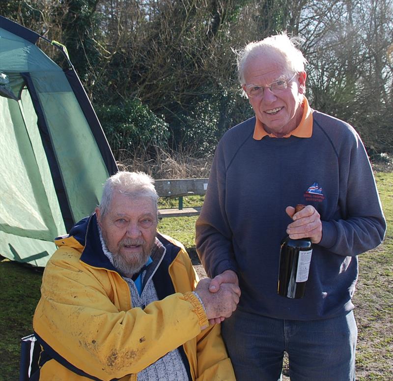 Race organiser, Peter Popham (seated) presenting the prize to the winner Roger Stollery during the Marblehead GAMES event at Three Rivers RYC photo copyright Martin Crysell taken at Three Rivers Radio Yachting Club and featuring the Marblehead class