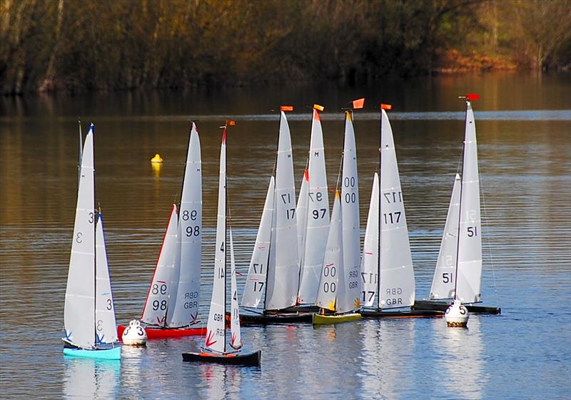 Virtually the whole fleet rounding the windward and spreader marks during the 40th Mermaid Trophy  photo copyright Roger Stollery taken at Guildford Model Yacht Club and featuring the Marblehead class