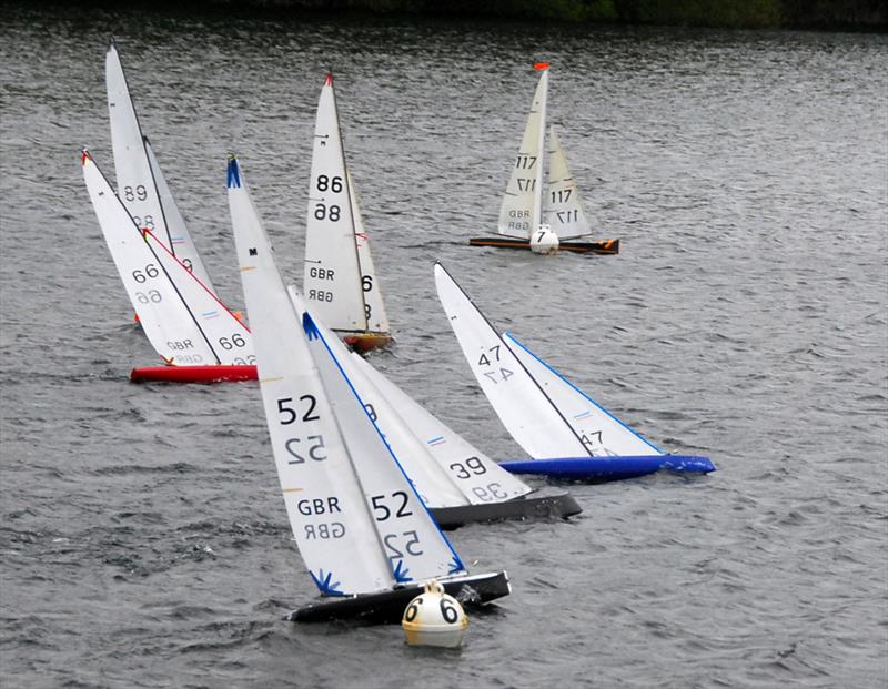 2021 M&S District Marblehead Championship - GAMES 5: Mark Robinson 47 leading the fleet away from the start photo copyright Roger Stollery taken at Guildford Model Yacht Club and featuring the Marblehead class