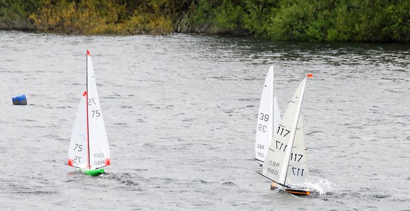 2021 M&S District Marblehead Championship - GAMES 5: Tony 75 and Peter 39 leading with Oliver 117 chasing hard photo copyright Roger Stollery taken at Guildford Model Yacht Club and featuring the Marblehead class