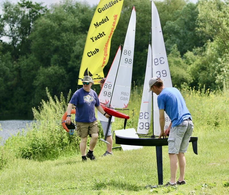 Darin Ballington 98 and Peter 39 first ashore after Race 5 of the Marblehead Mermaid Trophy - Note the very tall jib on Peter's balanced swing rig photo copyright Gillian Pearson taken at Guildford Model Yacht Club and featuring the Marblehead class