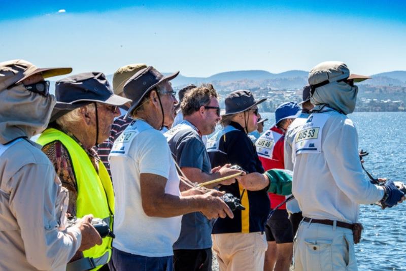 Concentration amongst the skippers at the windward mark photo copyright Robert Gavin taken at  and featuring the Marblehead class