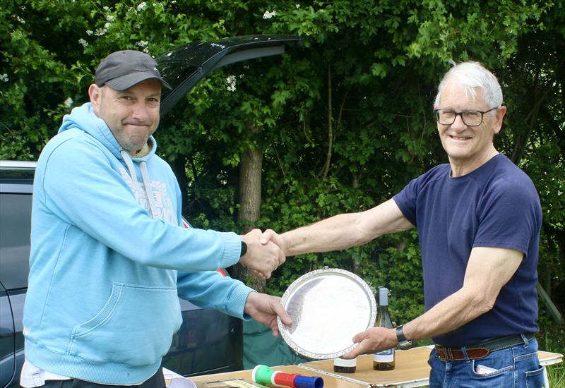 RO Charles Wand-Tetley on the right presenting the M&S District Marblehead Championship trophy to Chris Harris at Guildford photo copyright Gillian Pearson taken at Guildford Model Yacht Club and featuring the Marblehead class