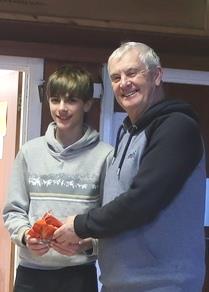 Marblehead GAMES 1 Chipstead - David Allinson presenting Oliver with a prize  photo copyright Stuart Ord-Hume taken at Chipstead Sailing Club and featuring the Marblehead class