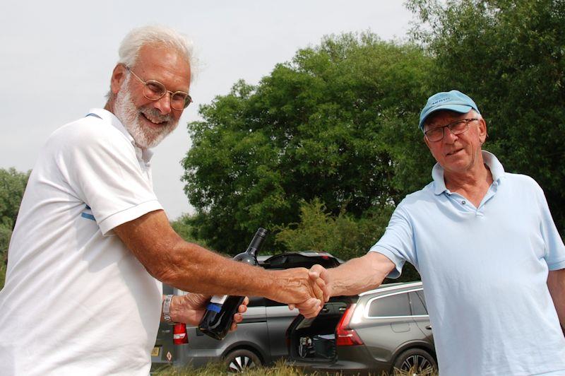 Barrie Martin (L) receives runner-up prize from RO Martin Crysell - Marblehead GAMES 5 event and Halfpenny Trophy at Abbey Meads photo copyright Roger Stollery taken at Guildford Model Yacht Club and featuring the Marblehead class
