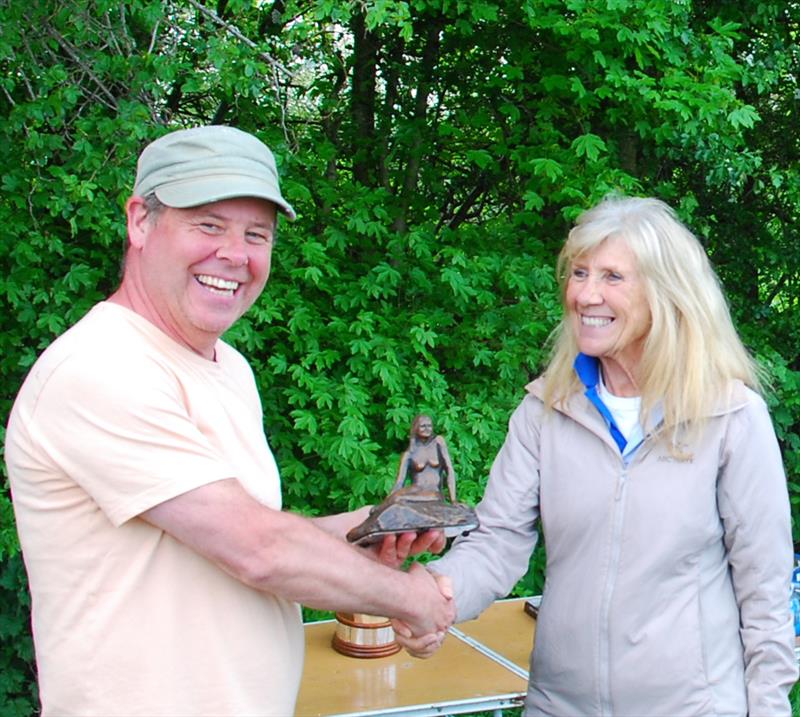 2024 Mermaid Trophy GAMES 4 at Guildford: Rob Vice being presented with the Mermaid Trophy by Celia Greetham photo copyright Martin Crysell taken at Guildford Model Yacht Club and featuring the Marblehead class