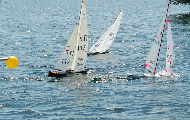 Oliver 117 and Peter 39 finishing as Chris 70 flashes by to the gate - Marblehead Nylet RM Challenge GAMES 6 at Littleton photo copyright Roger Stollery taken at Littleton Sailing Club and featuring the Marblehead class