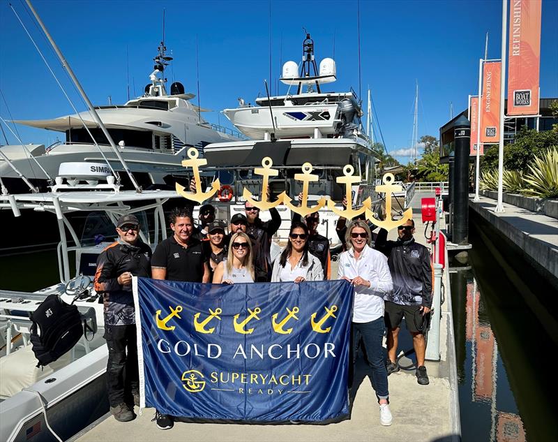 The Boat Works team being presented their flag photo copyright Marina Industries Association taken at  and featuring the Marine Industry class