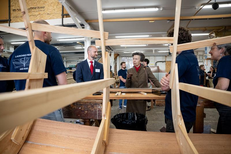 HRH The Princess Royal was given a tour of the Boat Building Academy in Lyme Regis by Director Will Reed (left) and met past and present students - photo © Philippa Gedge Photography