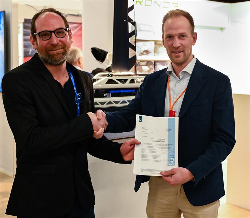 Tom Wolodarsky, Senior Surveyor and Lead Specialist WASP, LR (left) presenting the AiP to Hermen de Jong, Innovation Manager, Rondal at Metstrade 2025 in Amsterdam - photo © Lloyd's Register