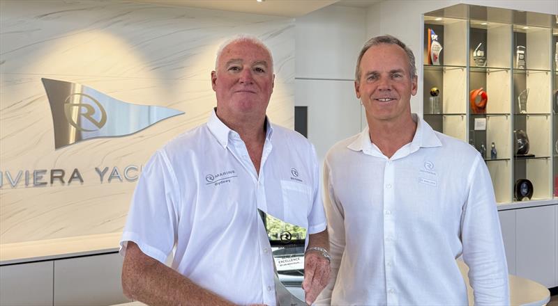 Michael Joyce (left) from R Marine Sydney accepts the award from Rodney Longhurst for Service Excellence by an Individual on behalf of Ben Piggot photo copyright Riviera Australia taken at  and featuring the Marine Industry class