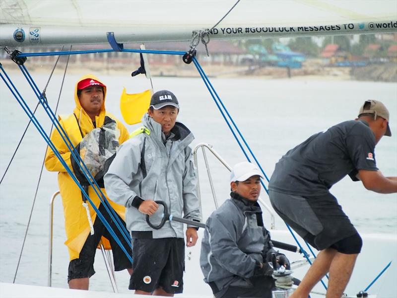 Sime Darby Foundation/1Malaysia Match Racing Team's Jeremy Koo (2nd from left) skippered his team to two victories on day 1 of the Liga Layar Malaysia 2014 Pulau Duyong match racing photo copyright Norzuhaira Ruhanie taken at  and featuring the Match Racing class