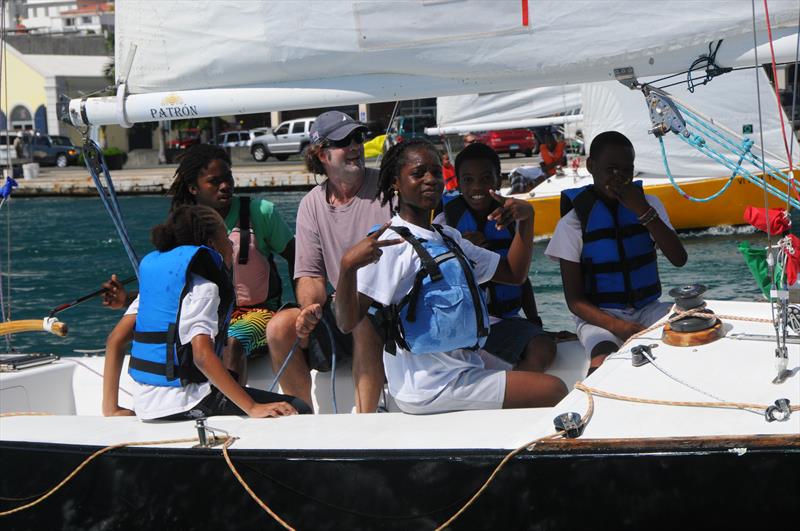 The USA's Dave Perry (second from left/purple shirt) participates in the short Youth Regatta, as a part of the Carlos Aguilar Match Race photo copyright Dean Barnes taken at St. Thomas Yacht Club and featuring the Match Racing class