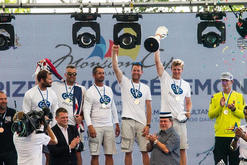 His Royal Highness Sultan Ibrahim Ibni Almarhum Sultan Iskandar presents Ian Williams and his GAC Pindar team the Monsoon Cup and the 2015 World Match Racing Tour trophy photo copyright Robert Hajduk / WMRT taken at  and featuring the Match Racing class