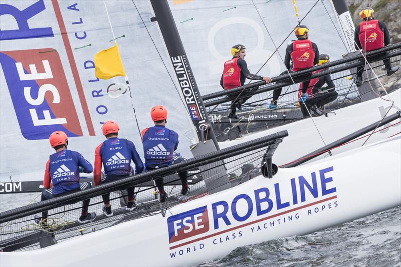 Phil Robertson, China One Ningbo (orange boat), vs Taylor Canfield, US One (grey boat) in the final of the GKSS Match Cup Sweden photo copyright Ian Roman / WMRT taken at Royal Gothenburg Yacht Club and featuring the Match Racing class