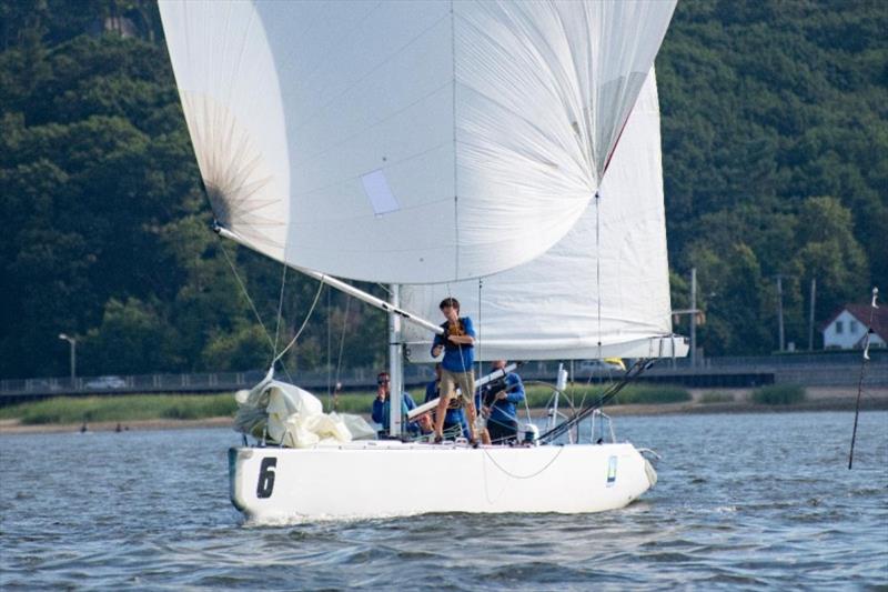 Trainee Joe Richter puts out the pole during Saturday's racing photo copyright Lexi Pline / Oakcliff Sailing taken at  and featuring the Match Racing class